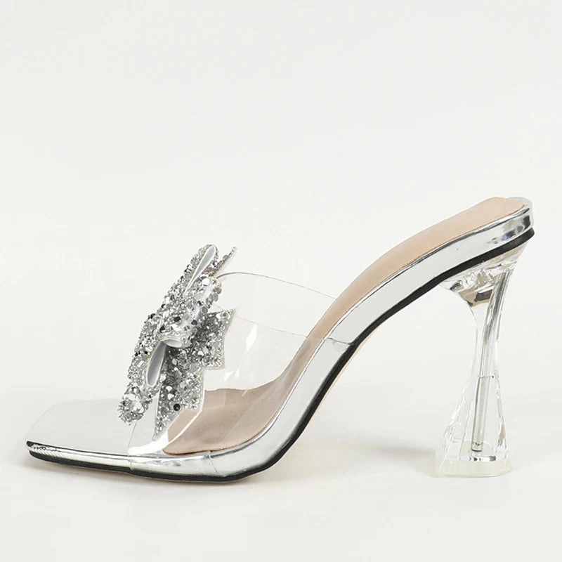 Liyke Mode Silber Pailletten Schmetterling Knoten Frauen transparente Hausschuhe Sommer Square Toe klare High Heels Sandalen Damenschuhe Tinkerbell Slippers